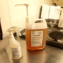 Antibacterial cleaner from South West Chemical shown in large and small volumes